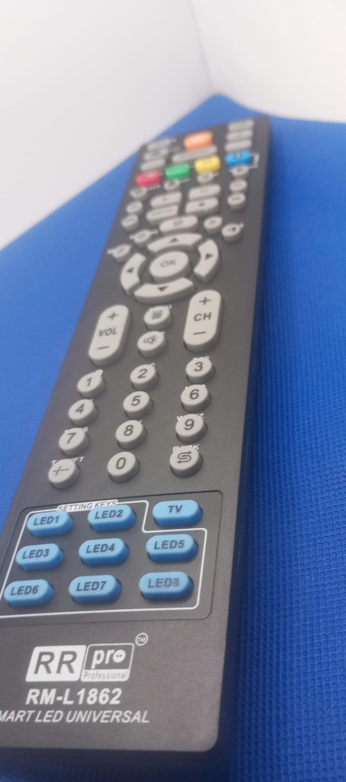 Universal remote control RM-L1862 with ergonomic design and wide device compatibility for TVs.